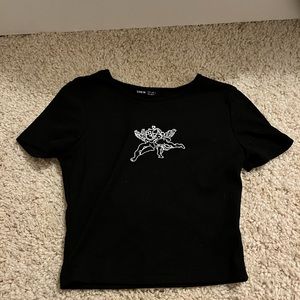 Black shirt with little angel design.